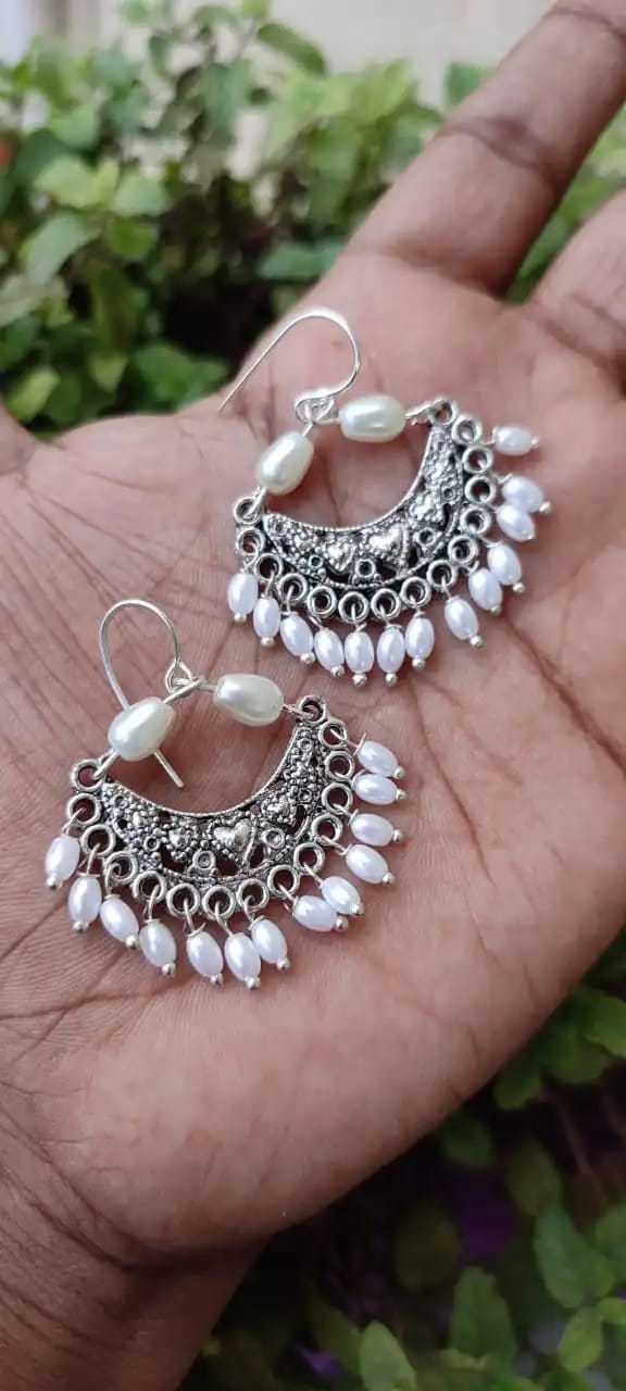 Jewellery worn by model